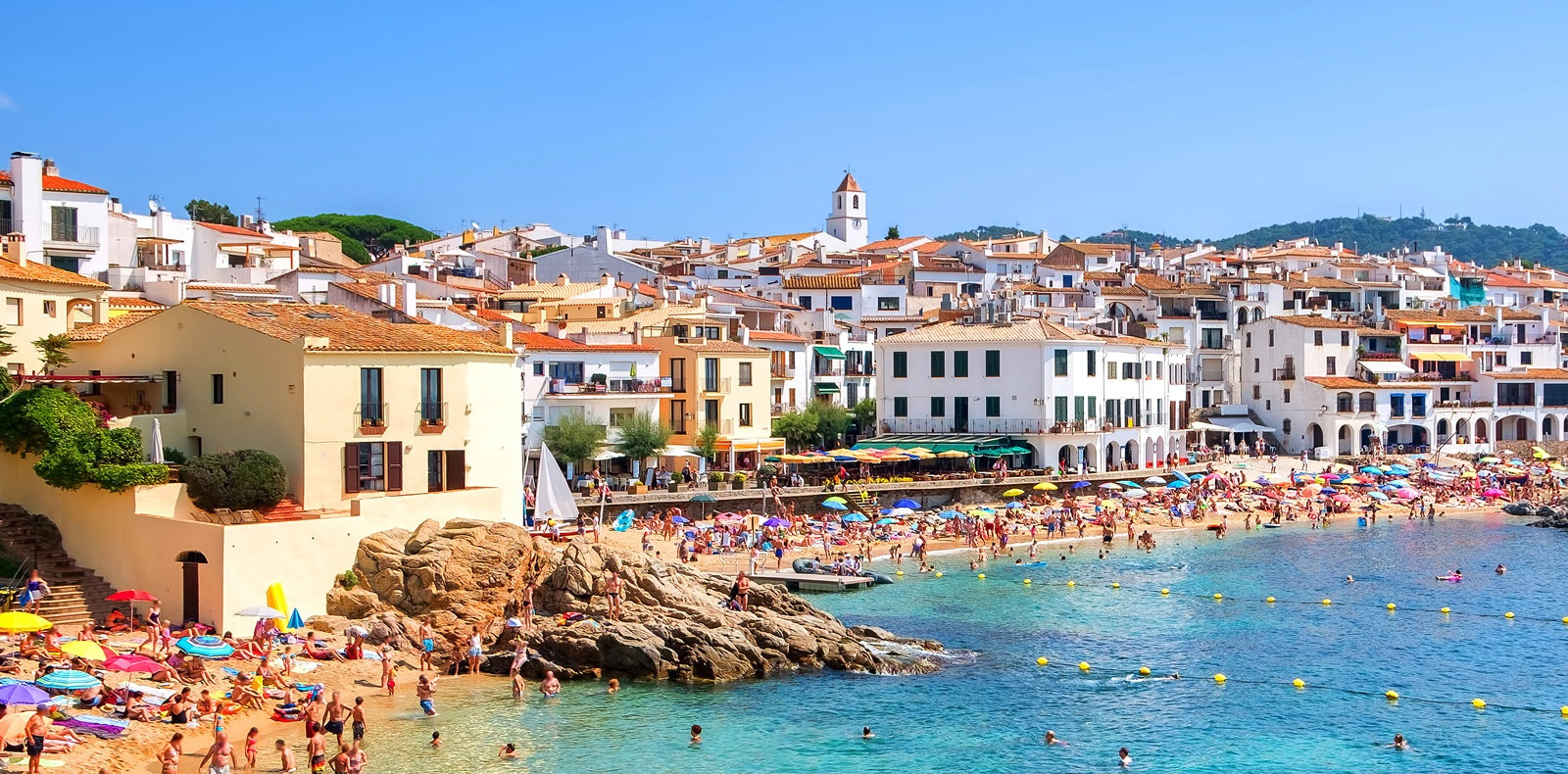 busy beach in spain